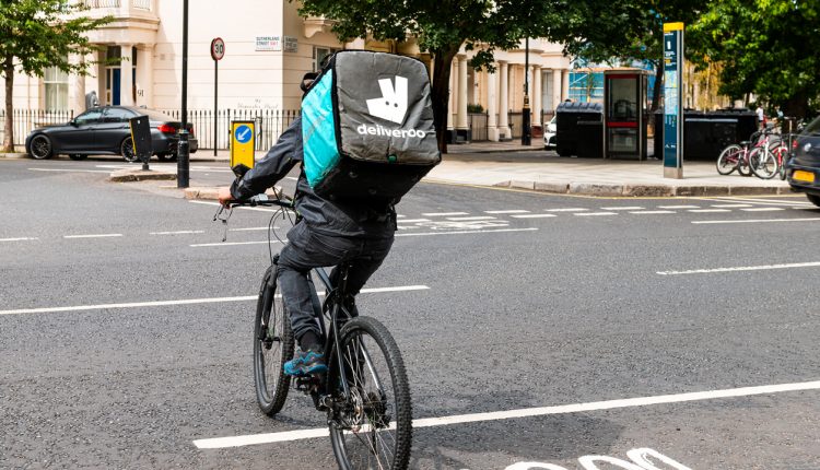 Deliveroo man on bicycle