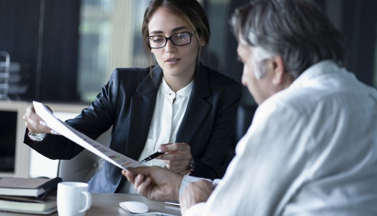 Female business consultant speaking with a client