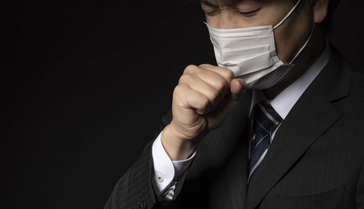 Businessman wearing a medical mask