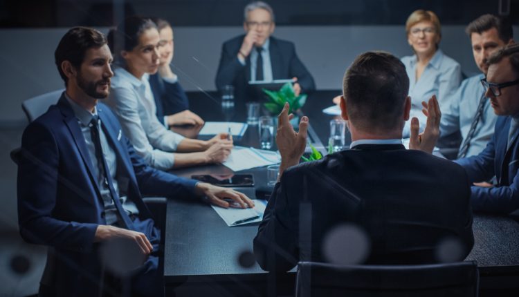 CFO giving a presentation in the boardroom