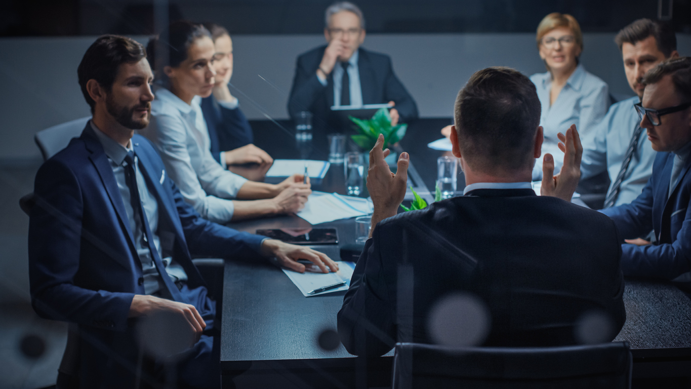 CFO giving a presentation in the boardroom