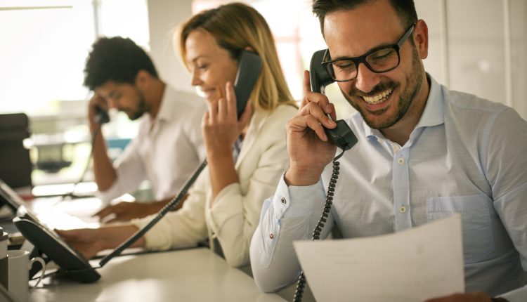 Call centre operators making sales