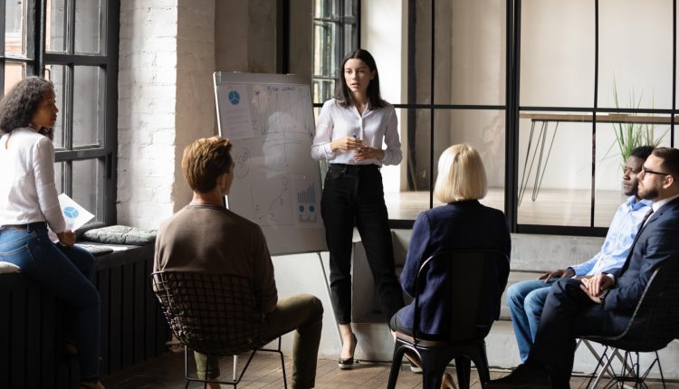 Female manager leading team meeting