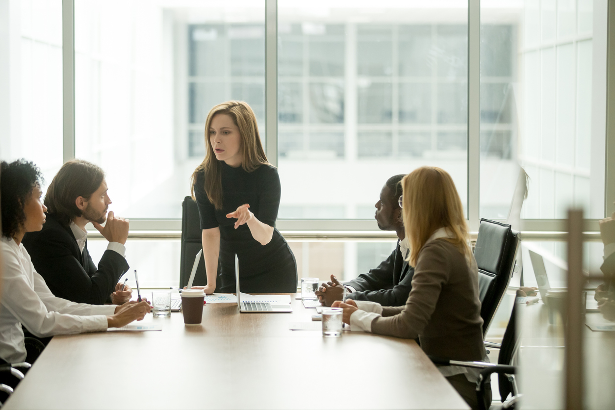 Female CEO leading board meeting