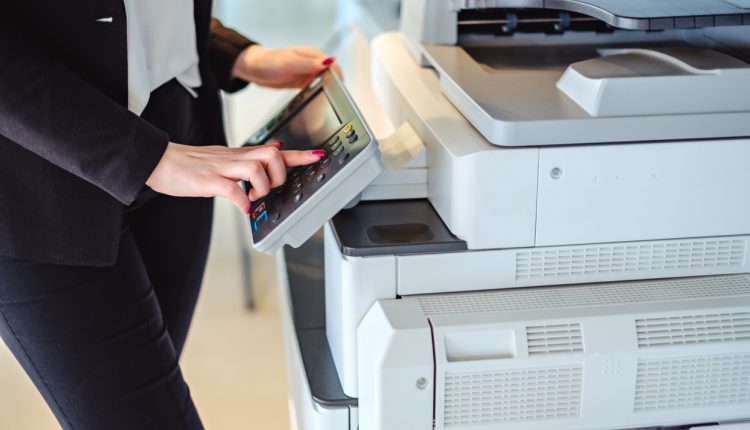 Office worker using printer