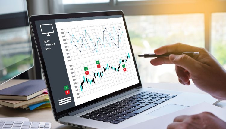 Sales graph on laptop screen