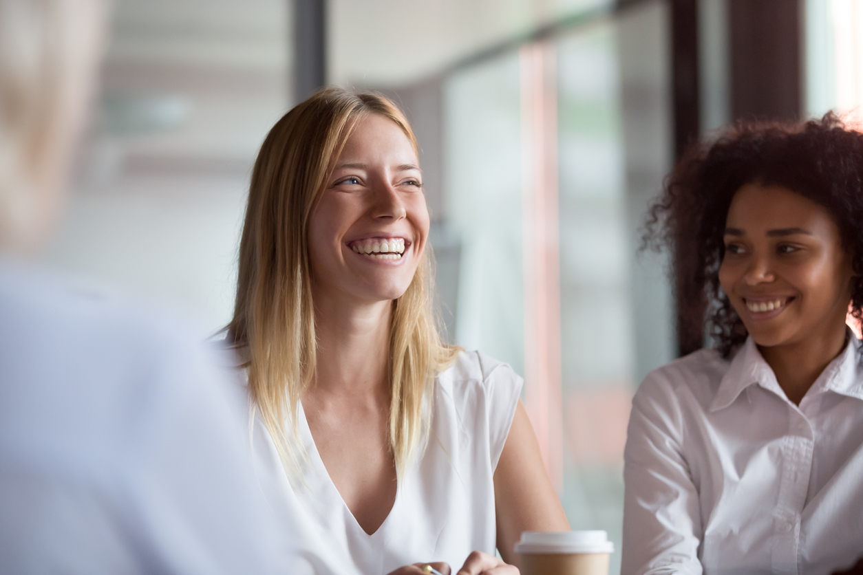 Happy employee in business meeting