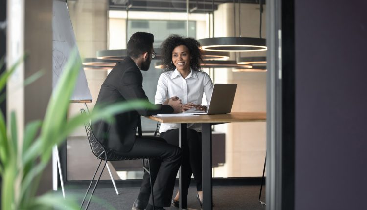 Employee and employer in meeting