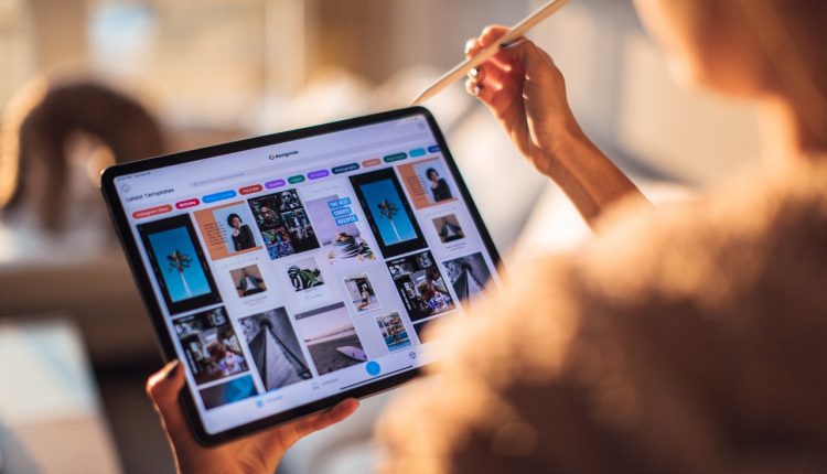 Woman using social media on tablet