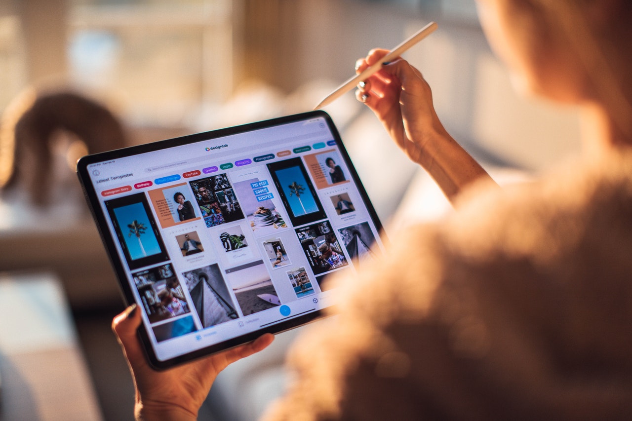 Woman using social media on tablet