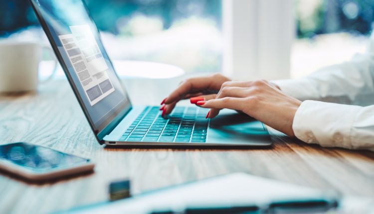 Person working on laptop from home