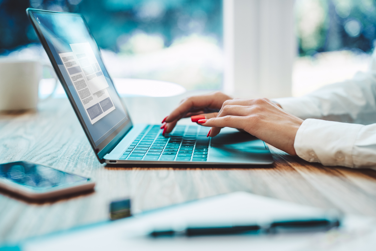 Person working on laptop from home