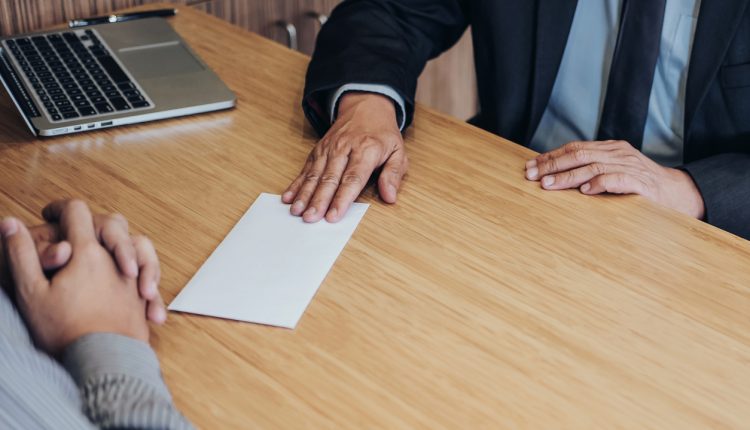 Employee handing in resignation