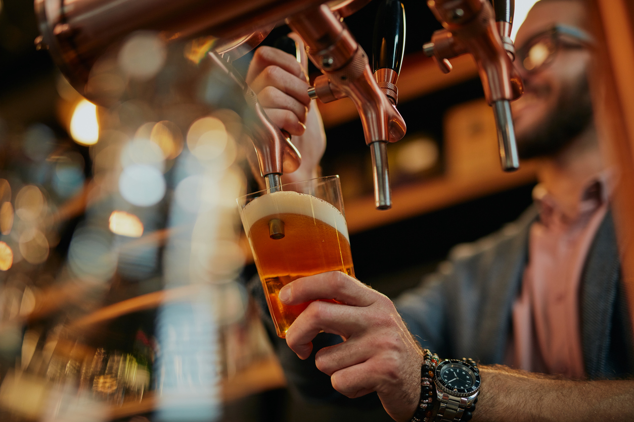 Barman serving customer