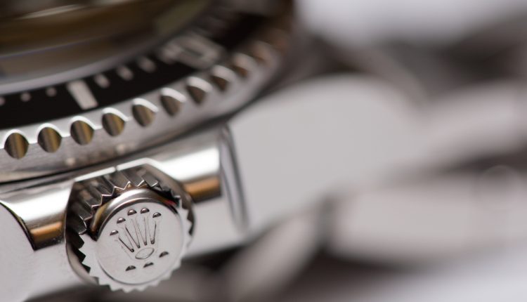 Rolex adjustment crown