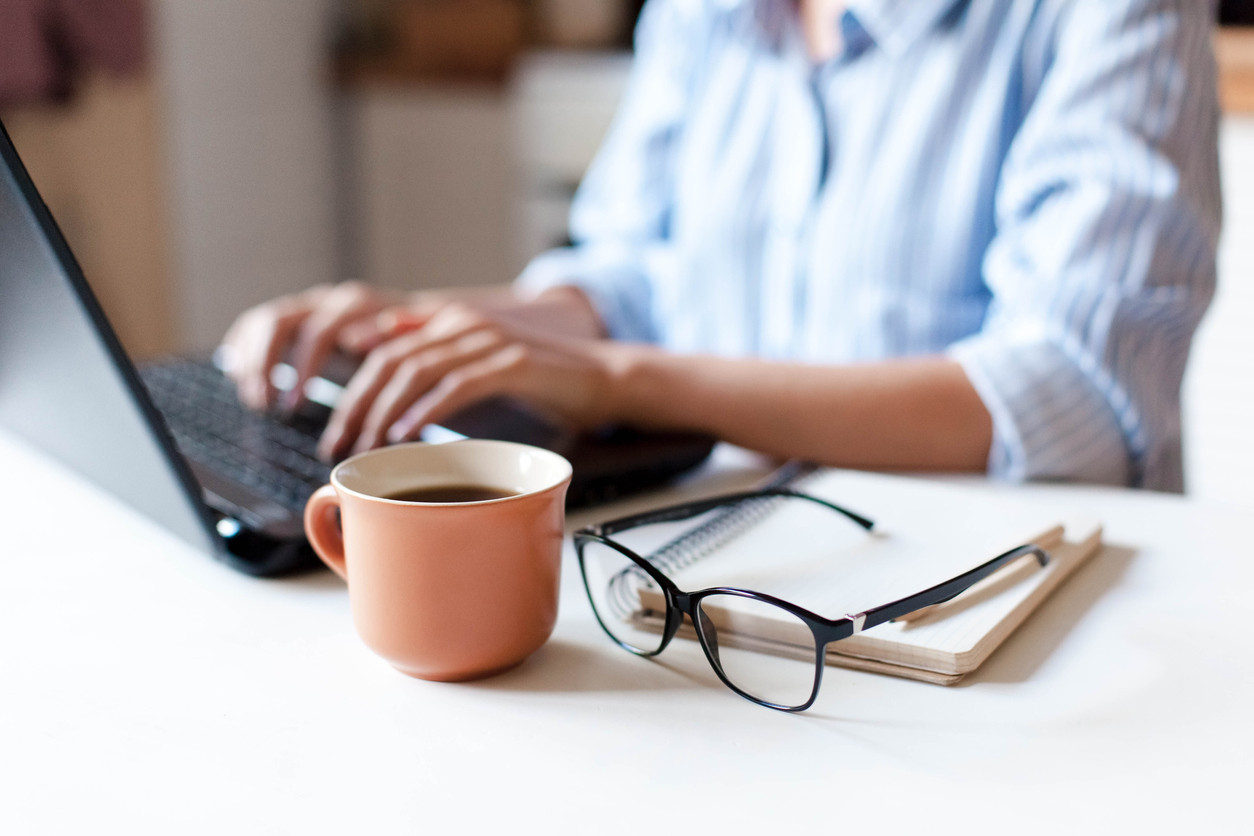 Person working on laptop from home