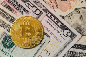 Bitcoin on dollar bills
