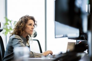 Focused employee working at desk