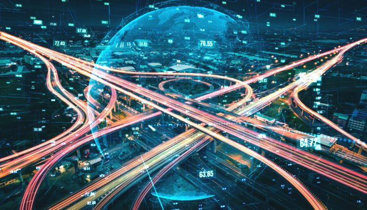 Future supply chain concept; roads crossing against digital blue globe