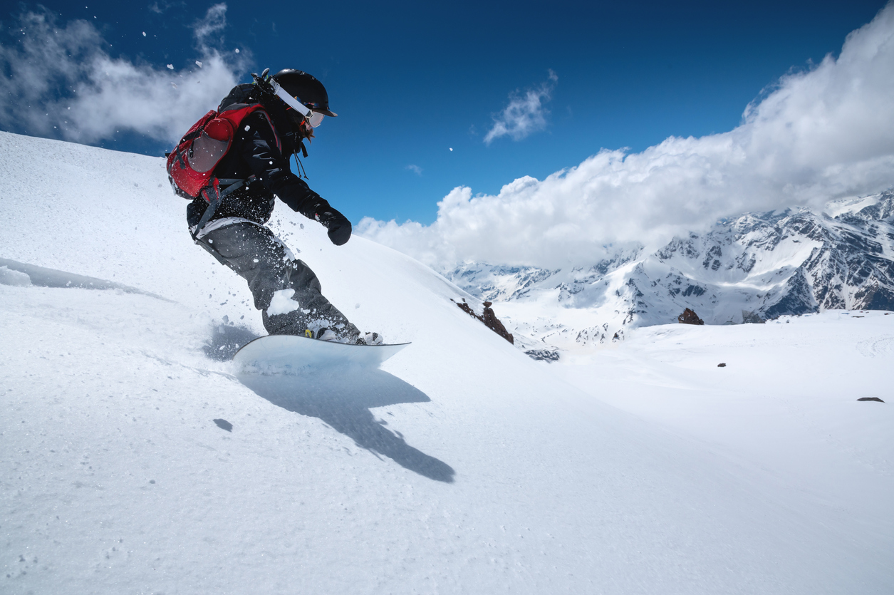 Woman snowboarding