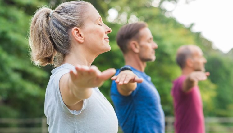 Group of people doing yoga