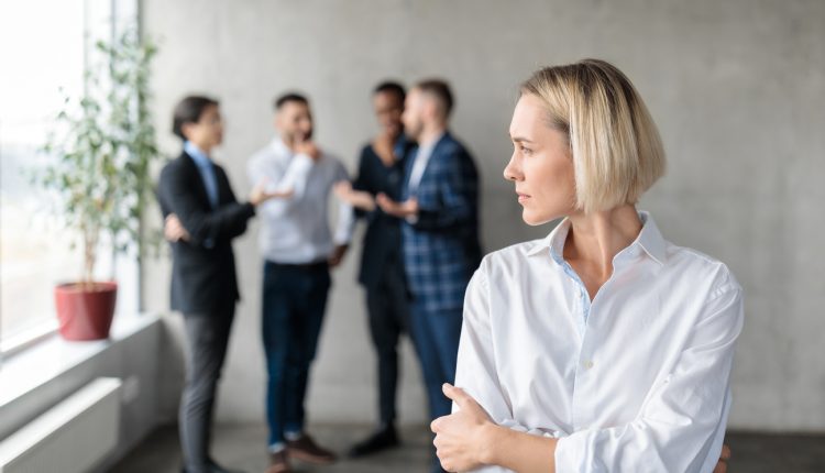 Toxic business culture; coworkers whispering behind colleagues back