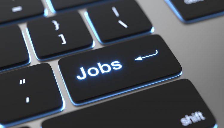 Job search concept; Jobs text on keyboard button
