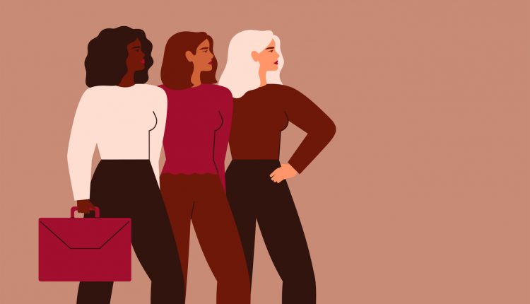Cartoons of confident business women stand in a row