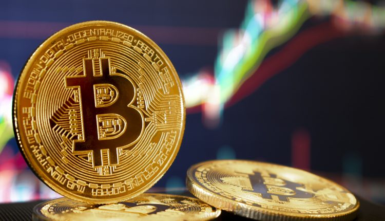 Bitcoin next to financial chart
