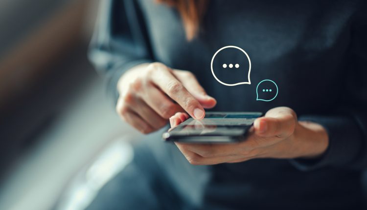 Woman using social media on phone