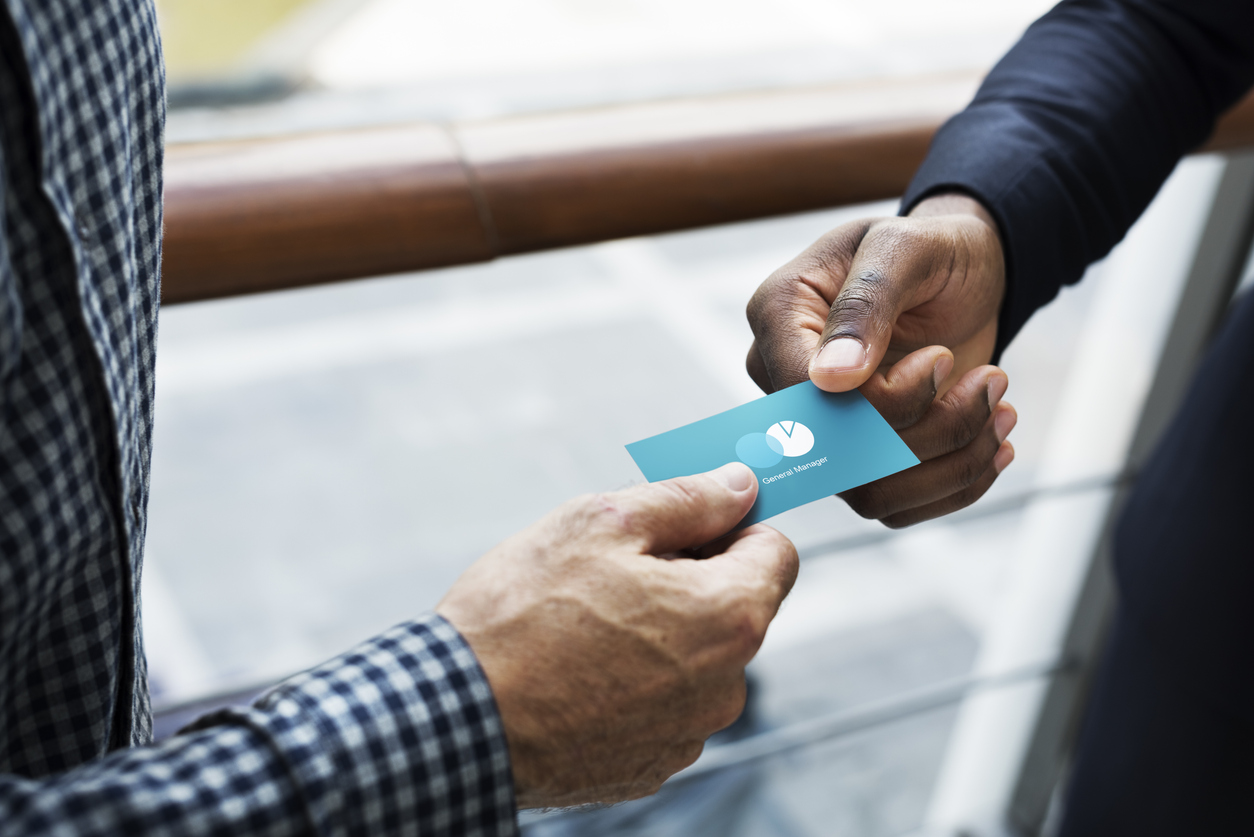 Business people exchanging a business card