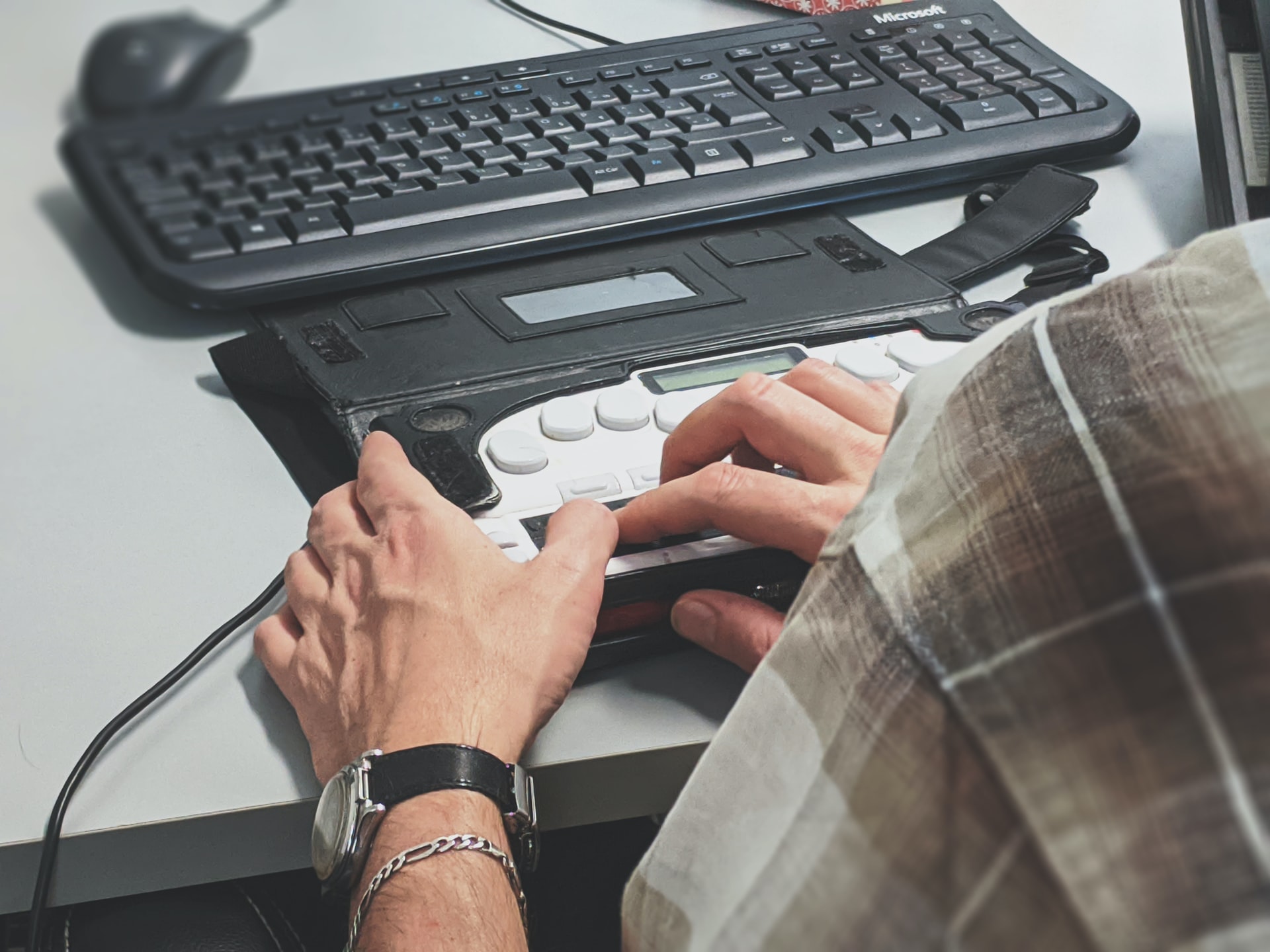 Employee with disabilities working at computer