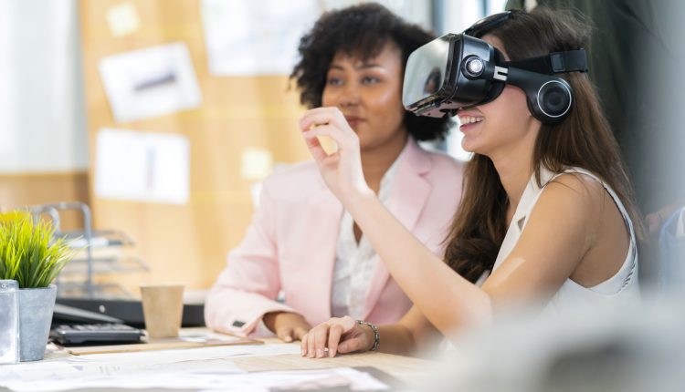 Employees venturing into the metaverse; VR headset at work