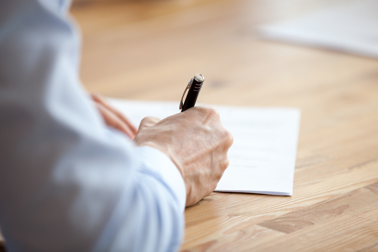 Man writing letter to his CEO