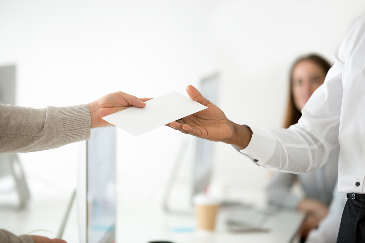 Employee handing in resignation