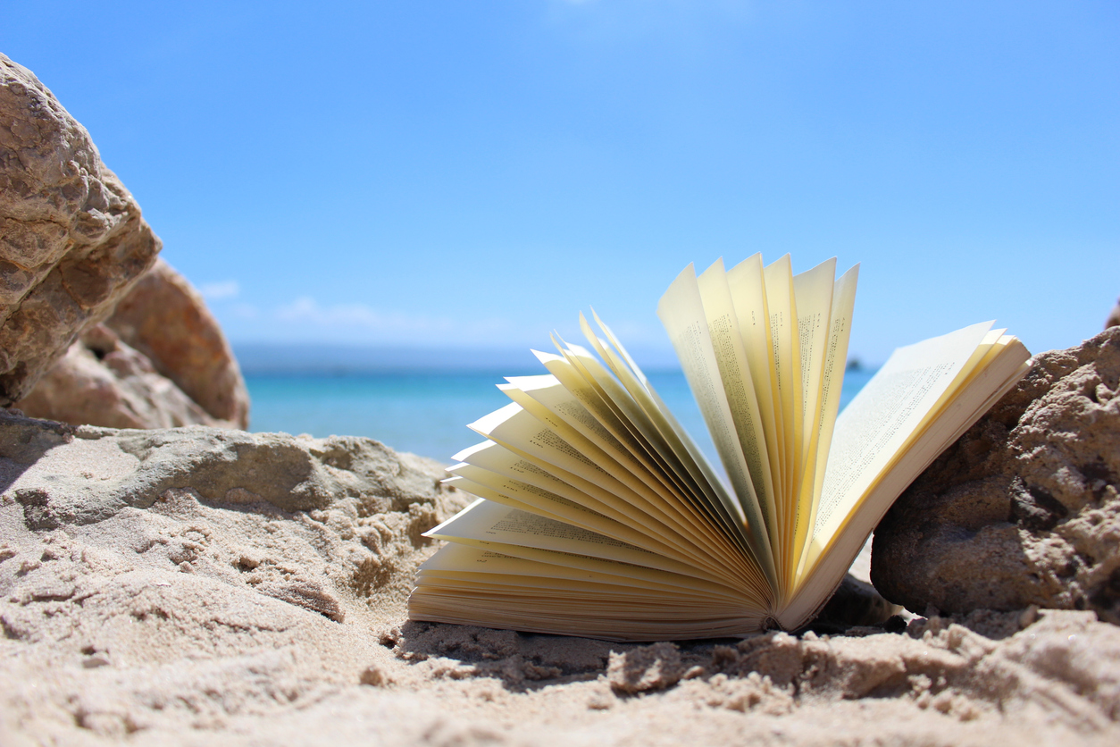 Open book on beach