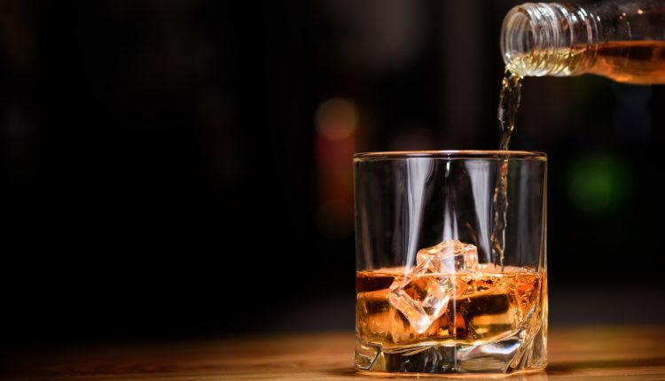 Whisky poured into glass