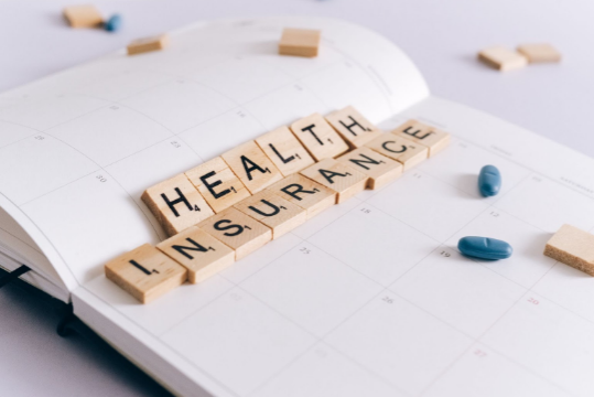 Health insurance scrabble letters