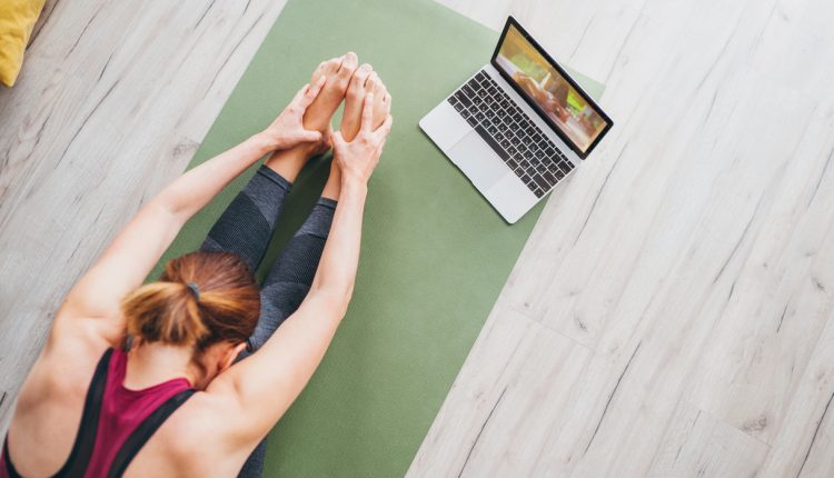 Woman doing yoga at home