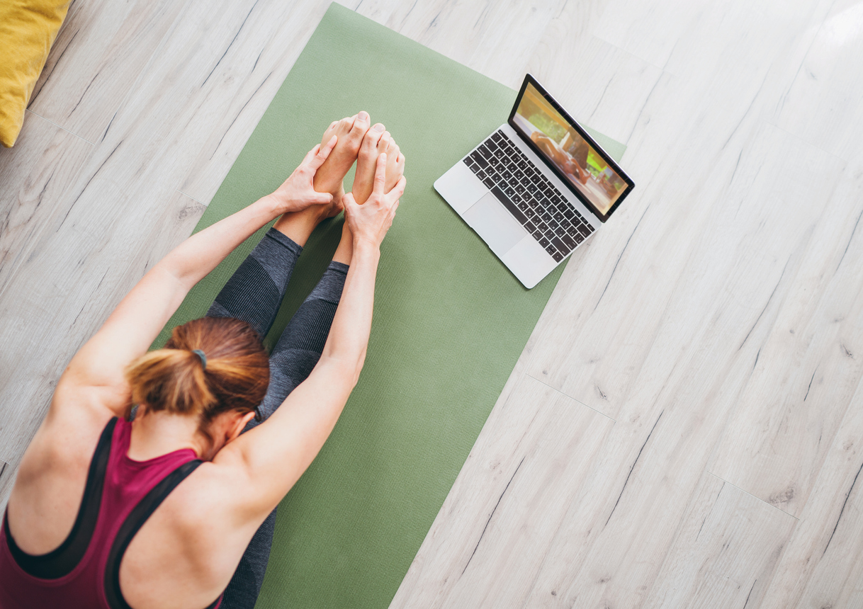 Woman doing yoga at home