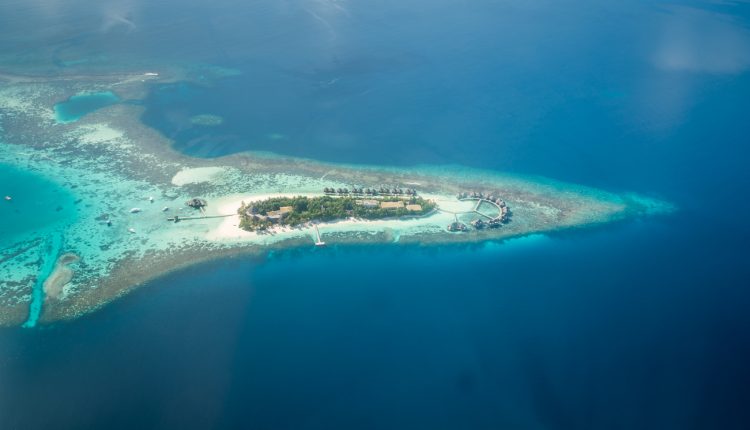 Tropical islands and atolls in Maldives from aerial view