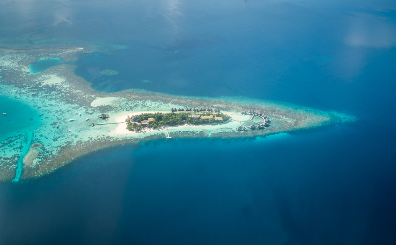 Tropical islands and atolls in Maldives from aerial view