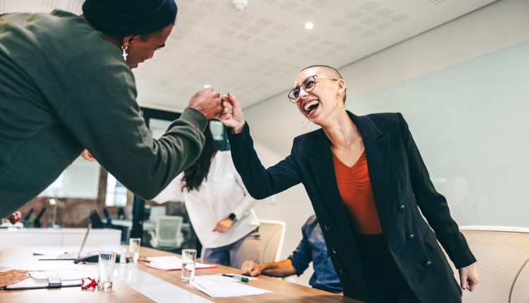 Colleagues enjoying positive workplace culture