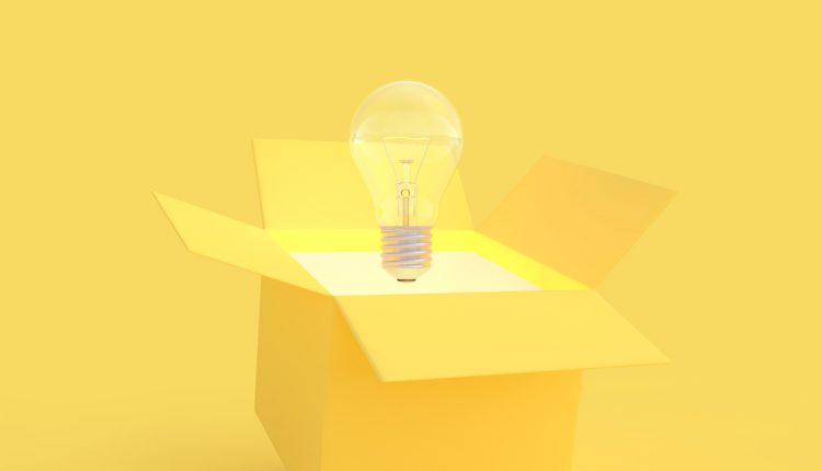 The light bulb drifted out of the gift box yellow color with clipping path. New idea and innovation concept and minimal style, 3D Render.