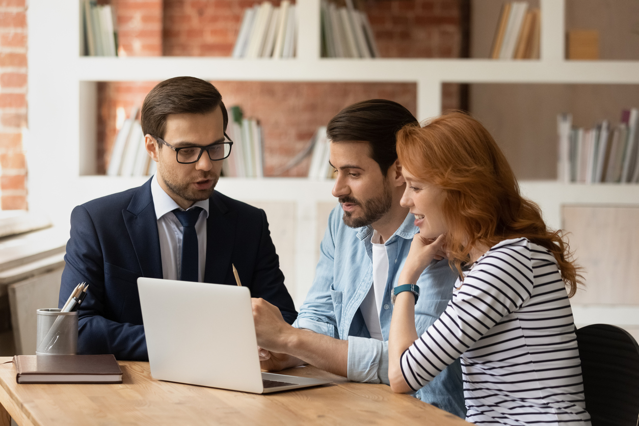 Real estate agent make offer for couple selects housing options, showing services presentation on laptop, choose new or secondary property for long term rental. Family and advisor discuss deal concept