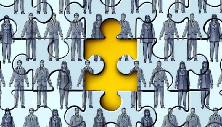 Missing employees and worker shortage or labour shortages as as employers are looking for needed workers and workforce job vacancies concept on a puzzle background in a 3D illustration style.
