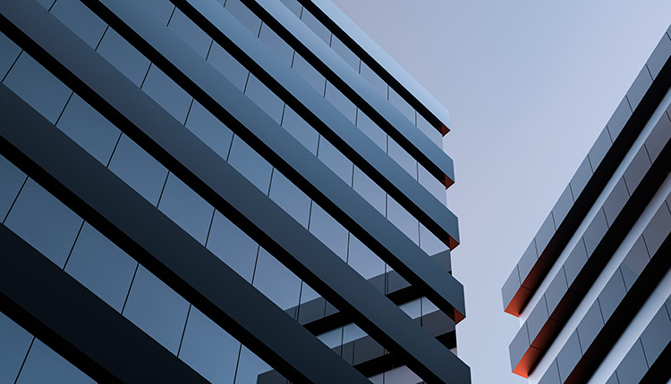 Picture of two high-rise buildings at dusk.