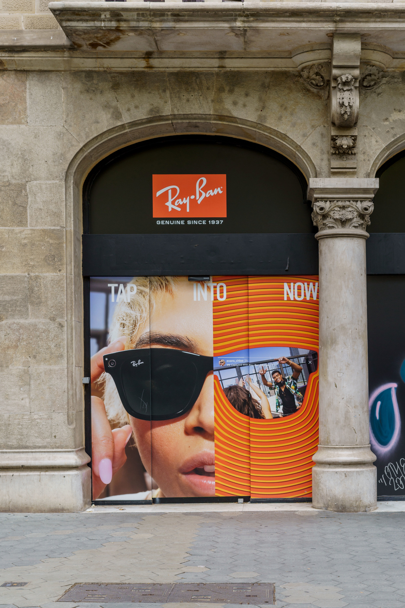 Barcelona, Spain - August 18, 2022. Logo and facade of Ray-Ban, an American-Italian brand of sunglasses and luxury eyewear founded in 1937 by Bausch & Lomb.