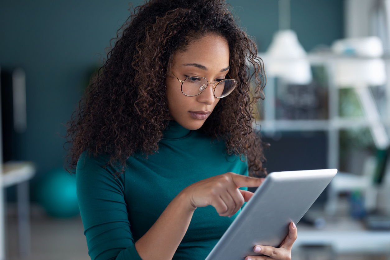 Young entrepreneur on tablet
