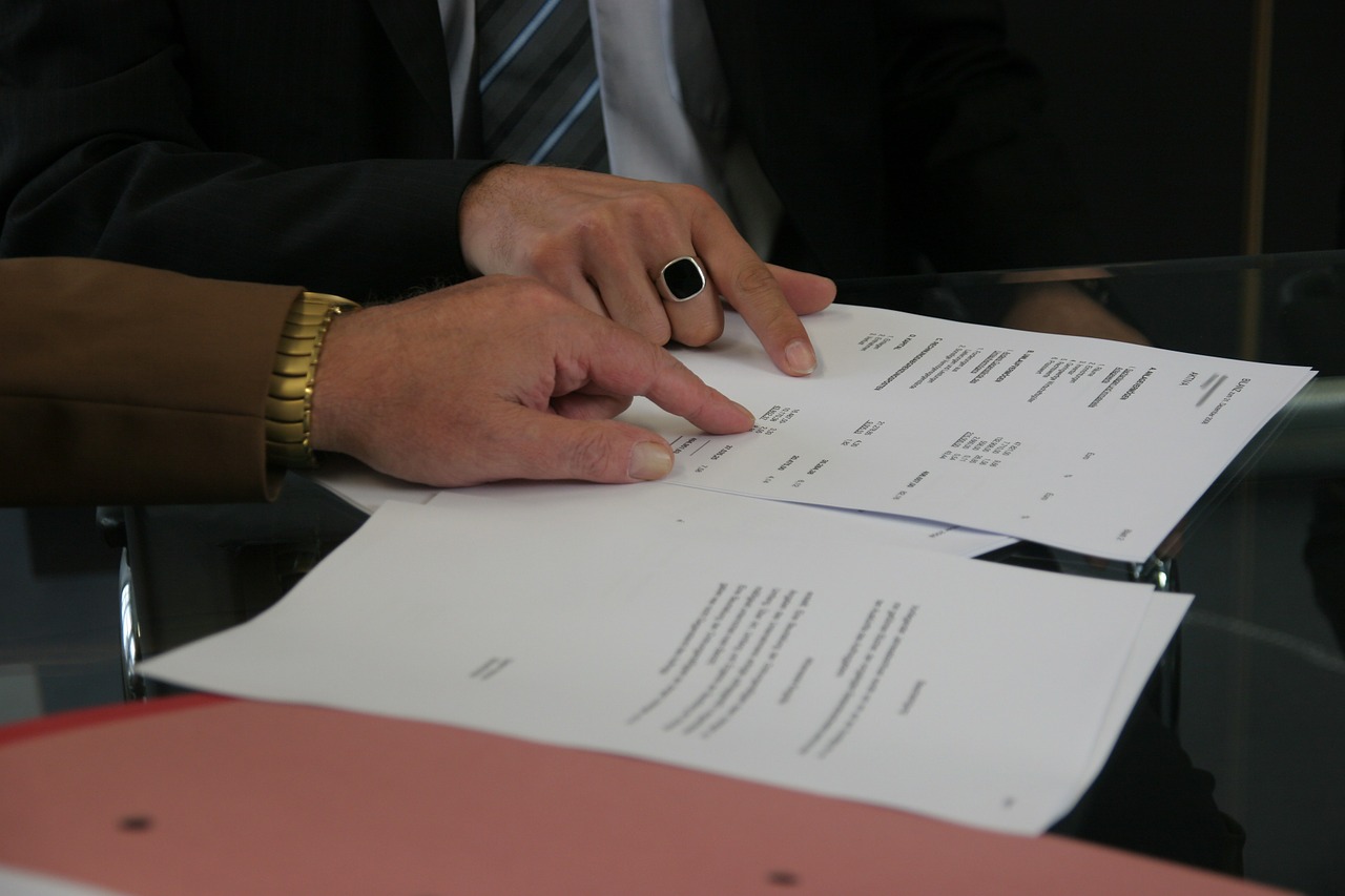 People looking over contract
